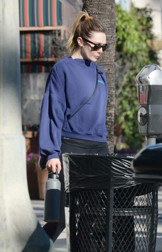 Elizabeth Olsen in a Blue Sweatshirt