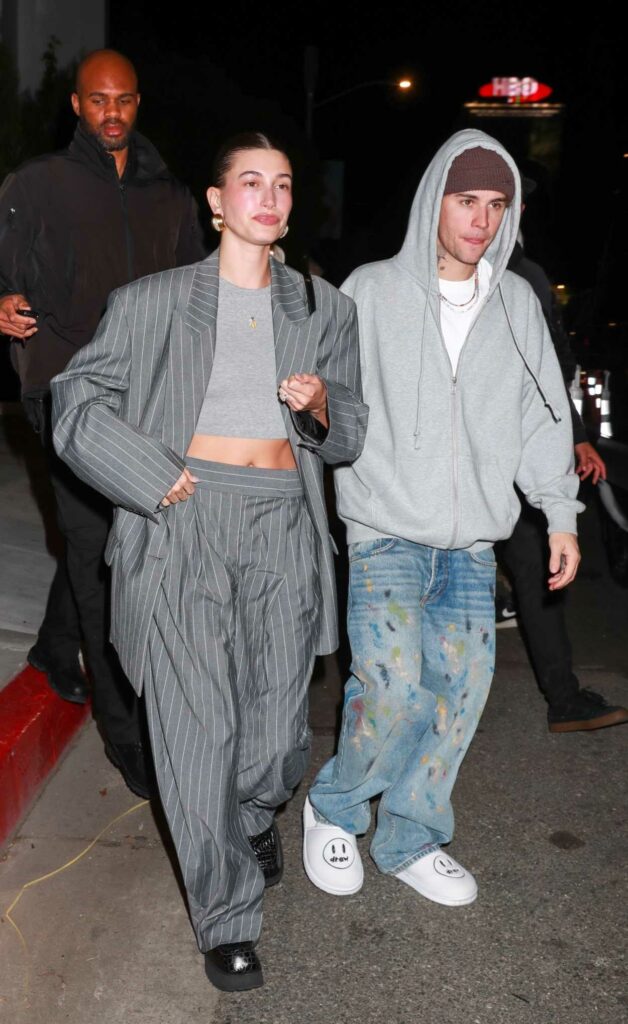Hailey Bieber in a Grey Striped Pantsuit