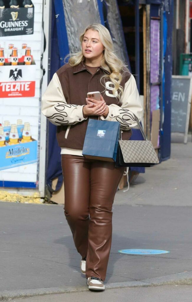Iskra Lawrence in a Brown Leather Pants