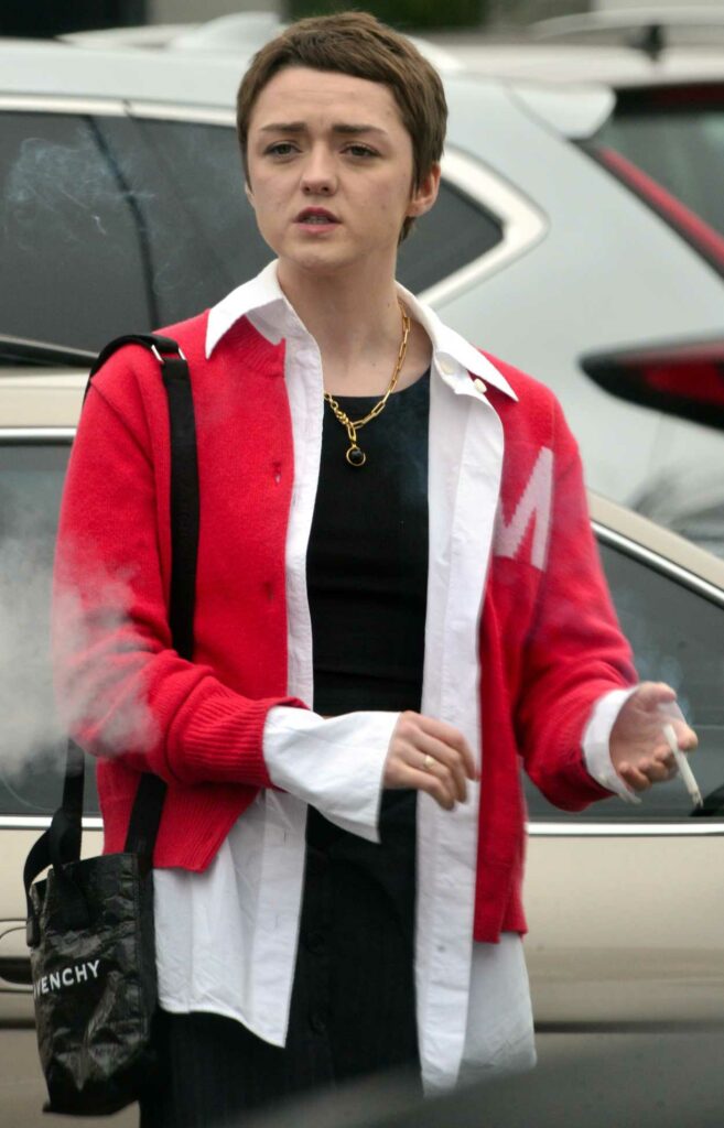 Maisie Williams in a Red Cardigan