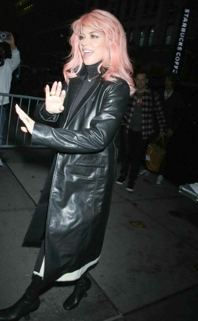 Shania Twain in a Black Leather Coat