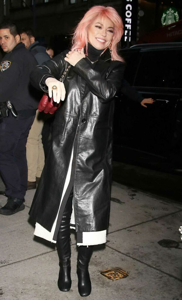 Shania Twain in a Black Leather Coat