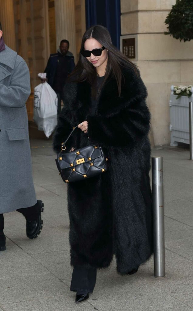 Sofia Carson in a Black Fur Coat