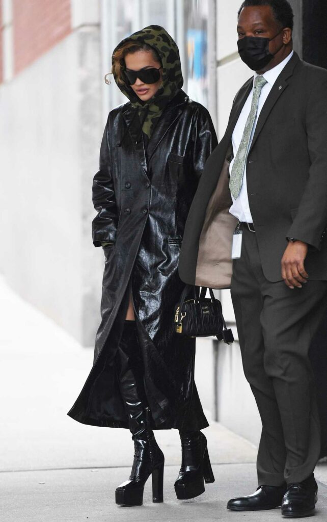 Rita Ora in a Black Leather Trench Coat