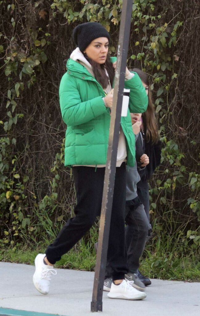 Mila Kunis in a Green Jacket