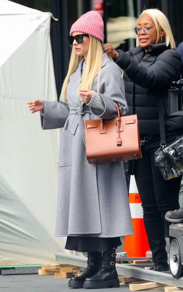 Emma Roberts in a Grey Coat