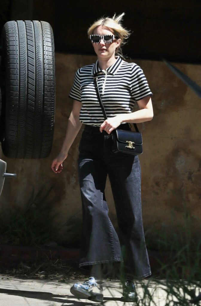 Emma Roberts in a Striped Polo
