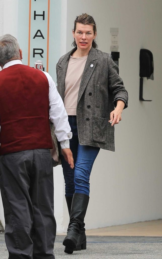 Milla Jovovich in a Grey Blazer