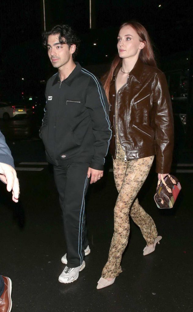 Sophie Turner in a Brown Leather Jacket
