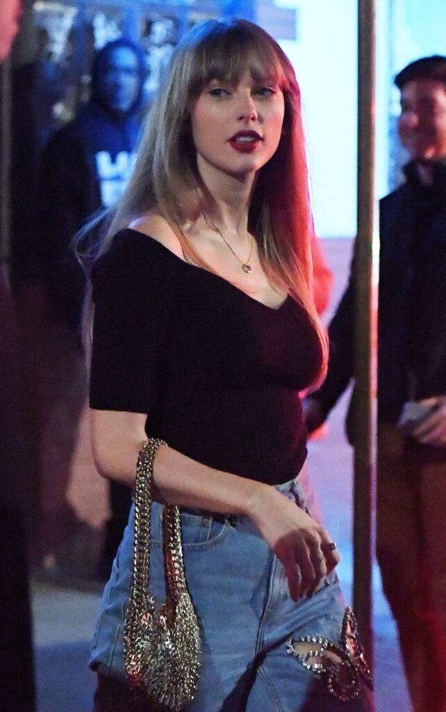 Taylor Swift in a Black Blouse