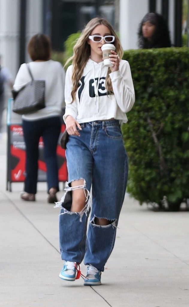 Alessia Vernazza in a Blue Ripped Jeans