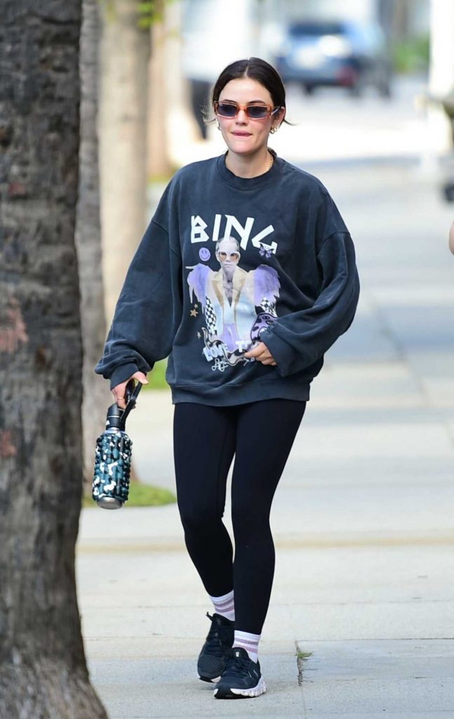 Lucy Hale in a Black Sneakers