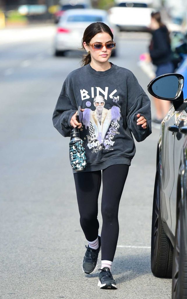 Lucy Hale in a Black Sneakers