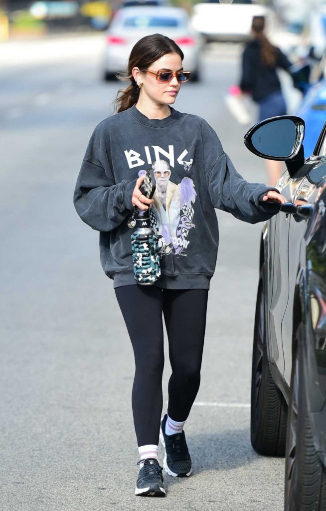 Lucy Hale in a Black Sneakers