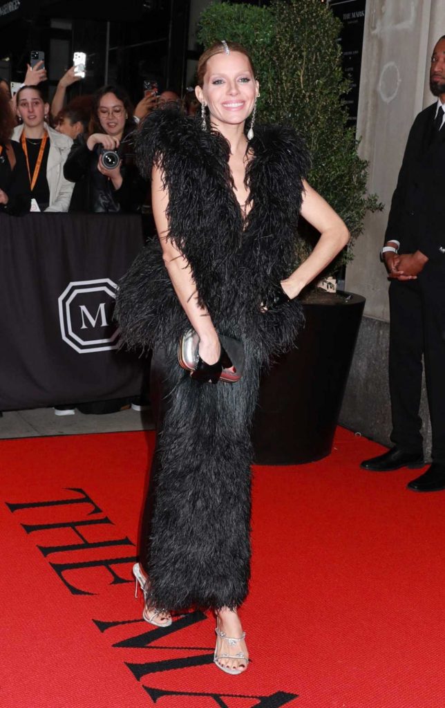 Sienna Miller in a Black Dress