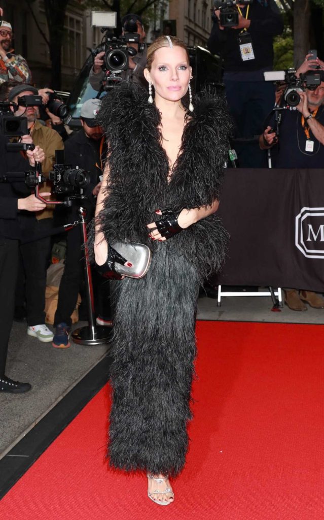 Sienna Miller in a Black Dress