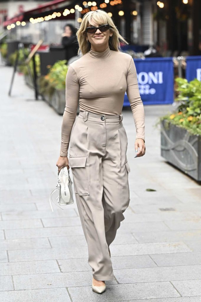 Ashley Roberts in a Beage Turtleneck