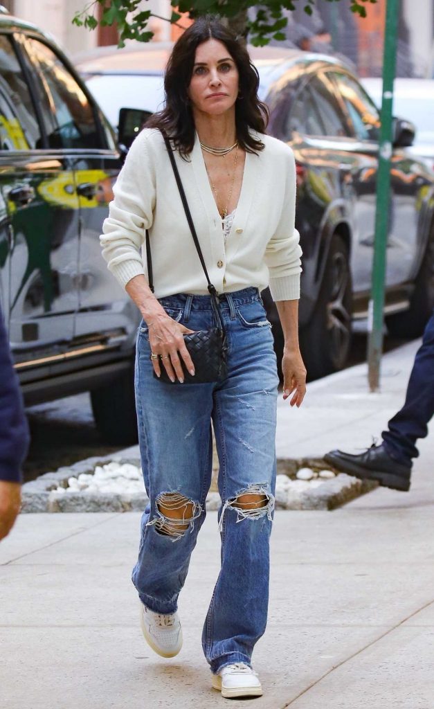 Courteney Cox in a Blue Ripped Jeans