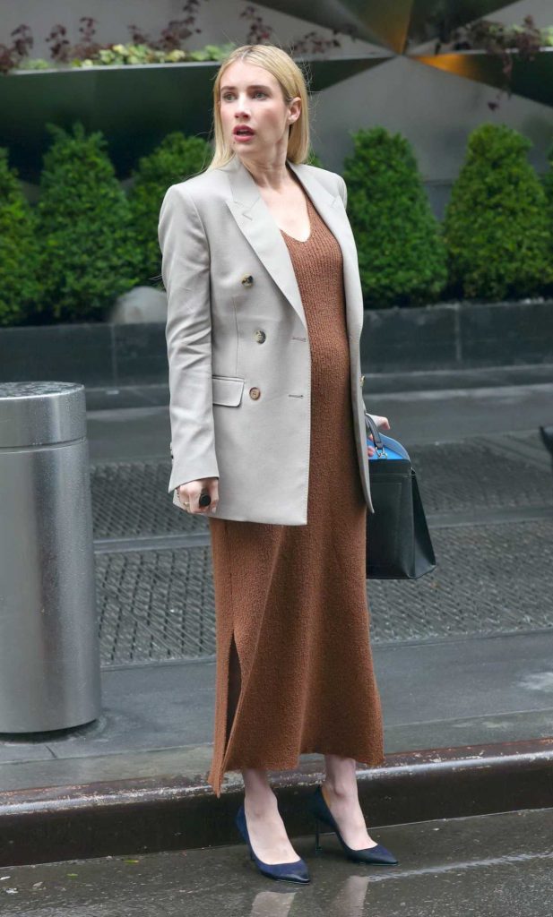 Emma Roberts in a Tan Dress
