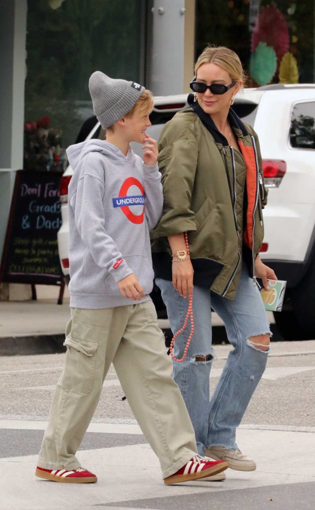 Hilary Duff in an Olive Bomber Jacket