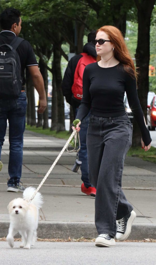 Madelaine Petsch in a Black Jeans