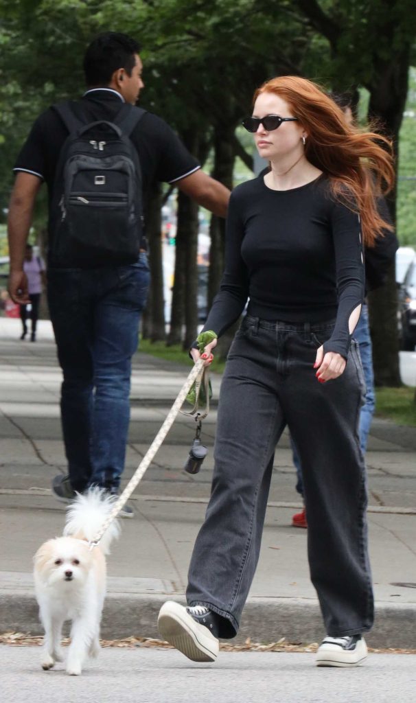 Madelaine Petsch in a Black Jeans