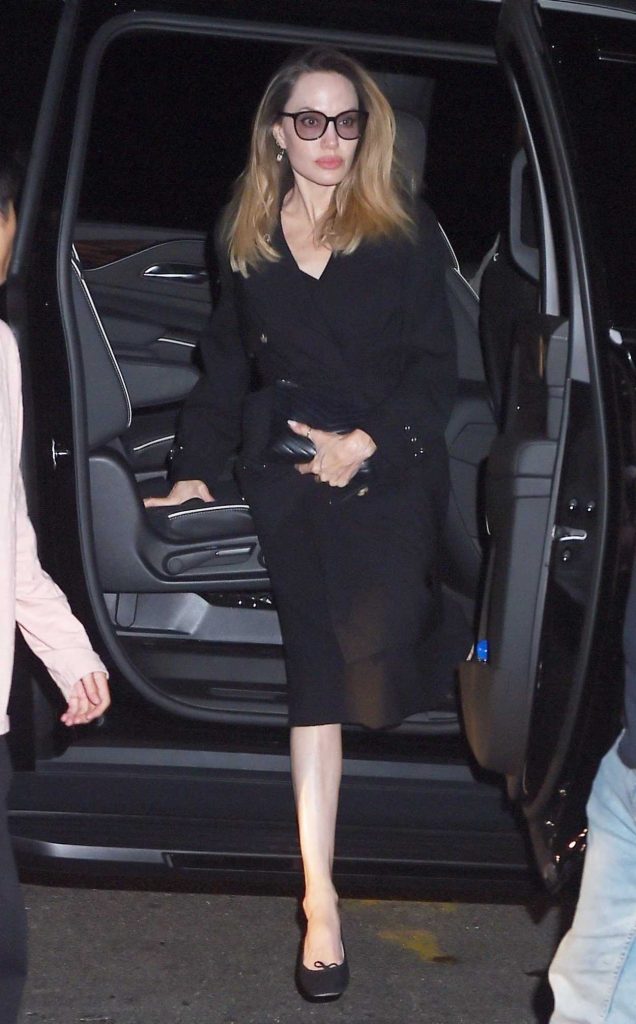 Angelina Jolie in a Black Trench Coat