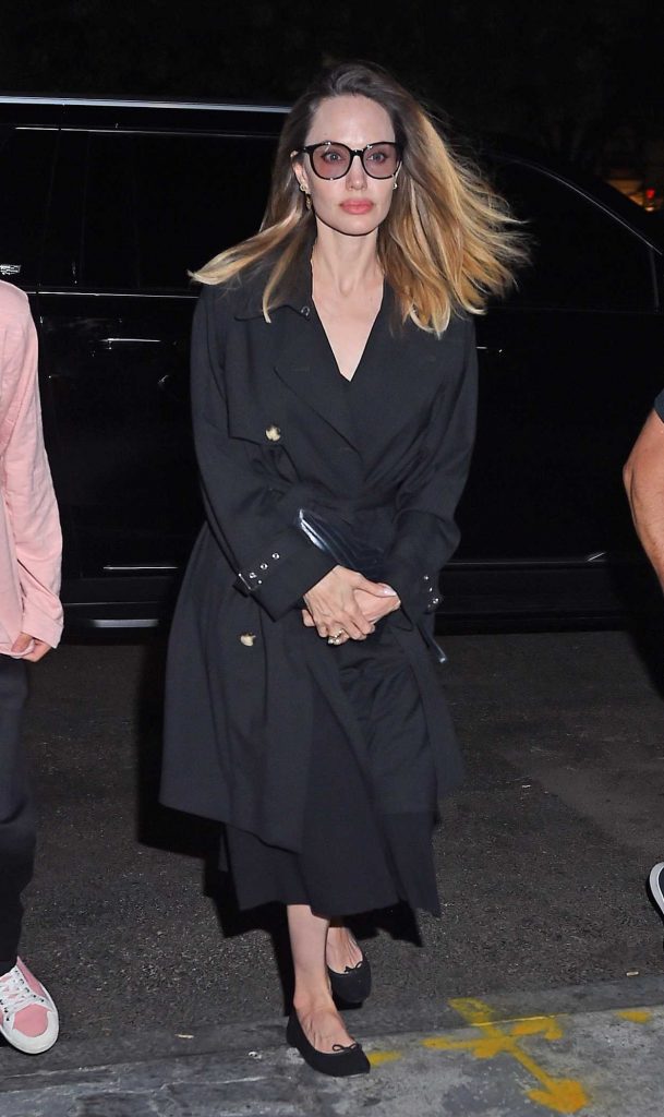 Angelina Jolie in a Black Trench Coat
