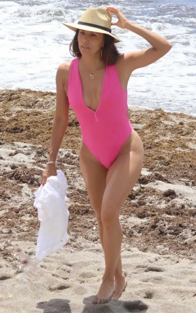 Eva Longoria in a Pink Swimsuit