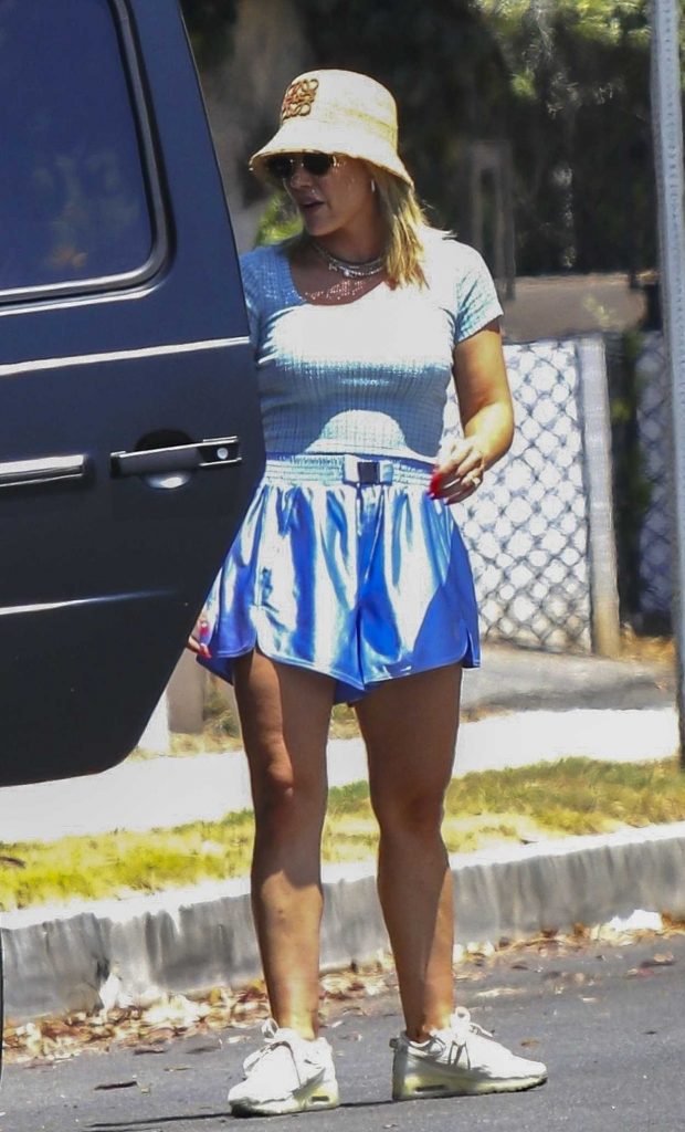 Hilary Duff in a Blue Shorts