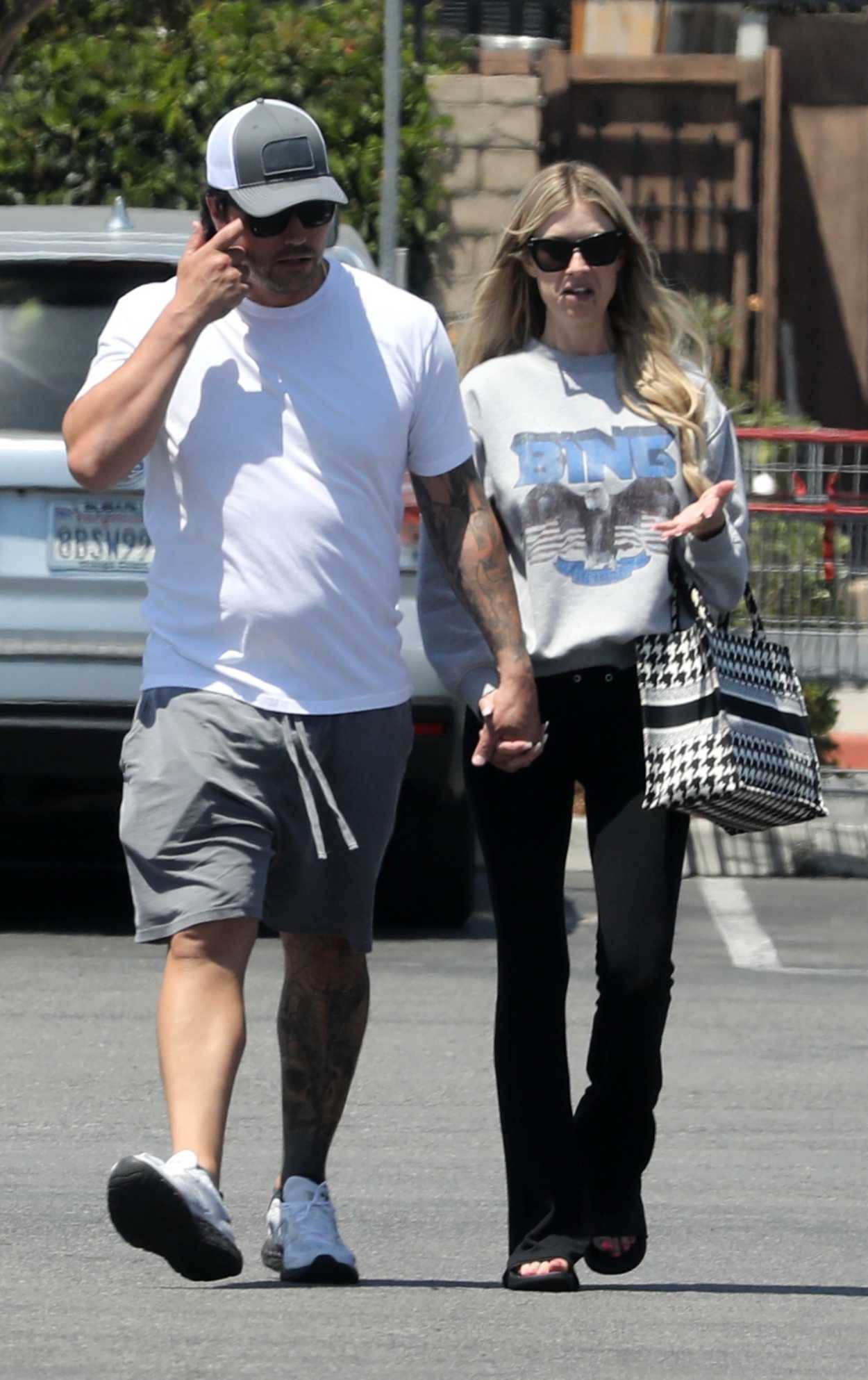 Christina Hall in a Black Pants Goes Shopping at Costco with Josh Hall