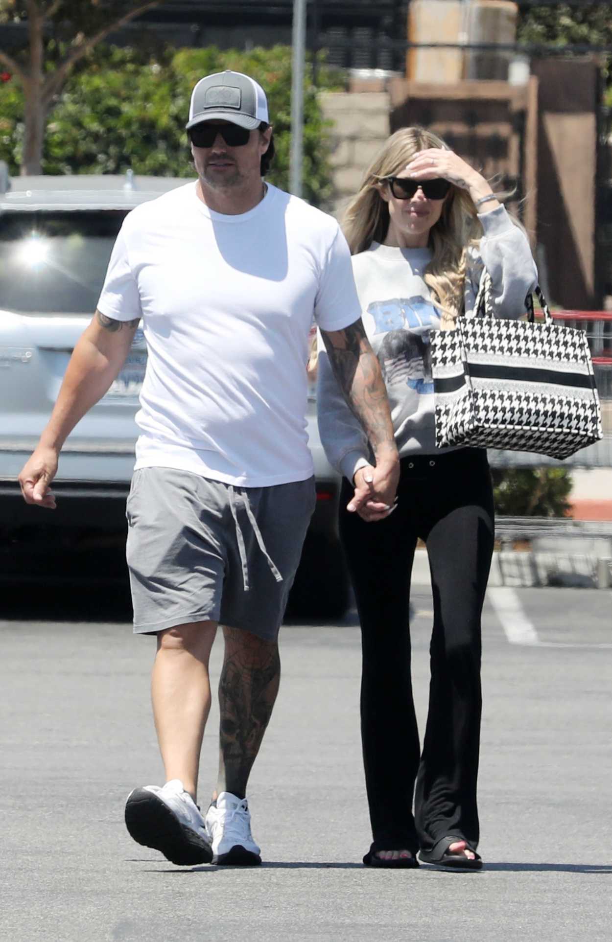 Christina Hall in a Black Pants Goes Shopping at Costco with Josh Hall