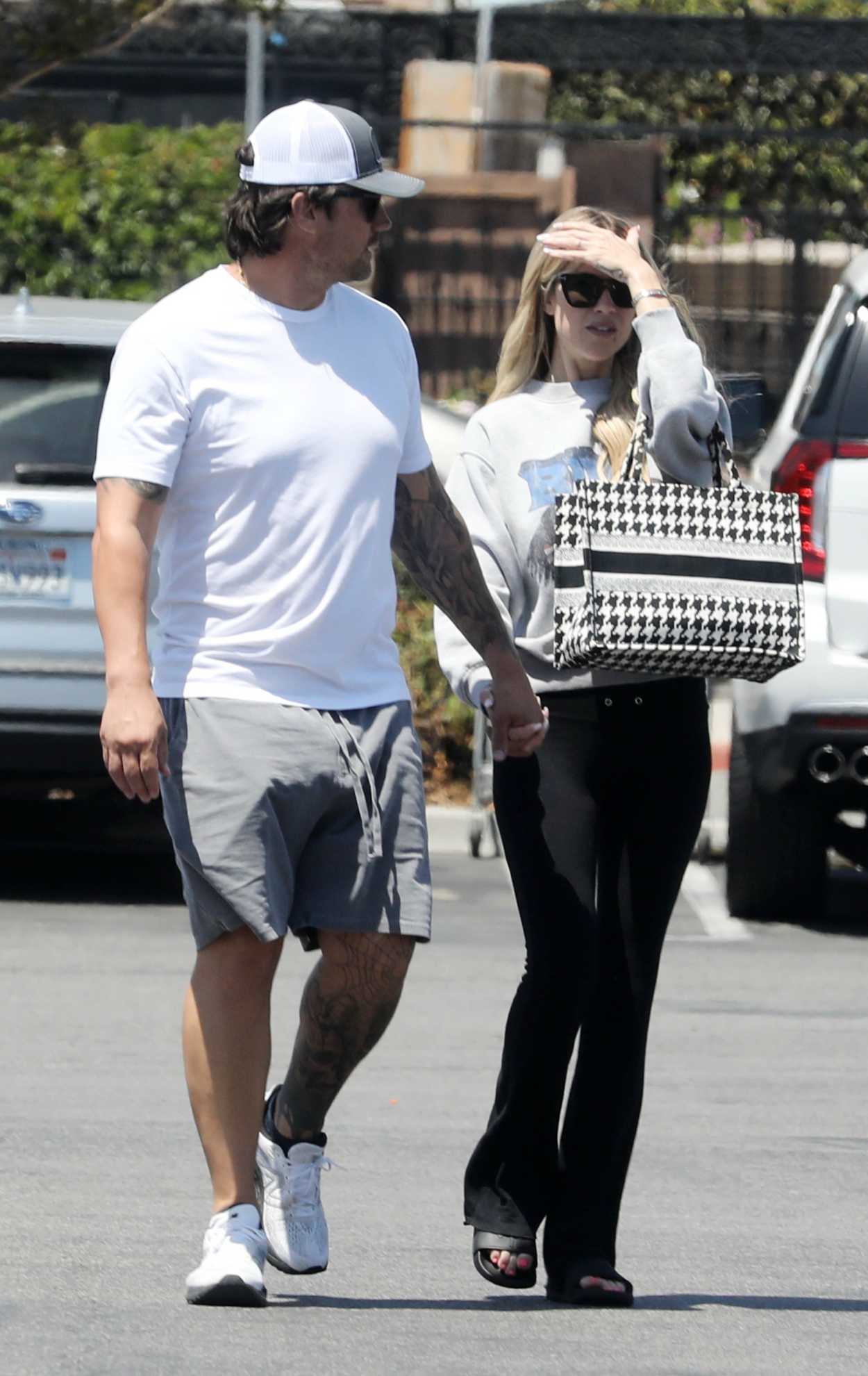 Christina Hall in a Black Pants Goes Shopping at Costco with Josh Hall