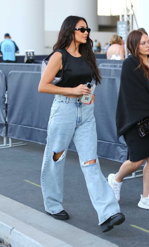 Shay Mitchell in a Blue Ripped Jeans
