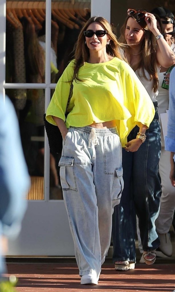 Sofia Vergara in a Neon Yellow Blouse