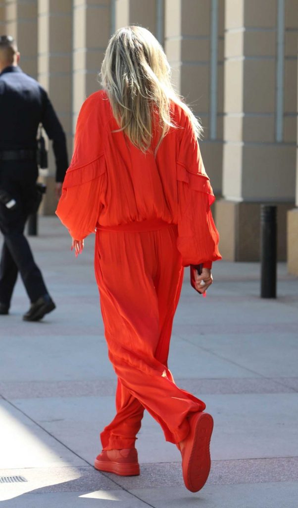 Heidi Klum in a Red Pantsuit