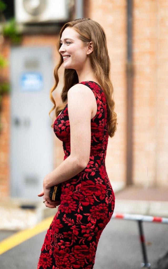 Larsen Thompson in a Red Floral Dress