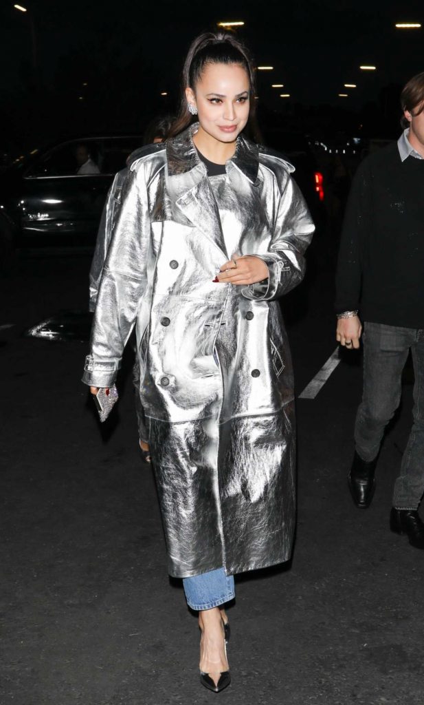Sofia Carson in a Silver Leather Coat