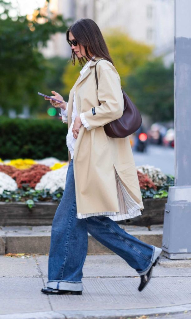 Karlie Kloss in a Beige Trench Coat