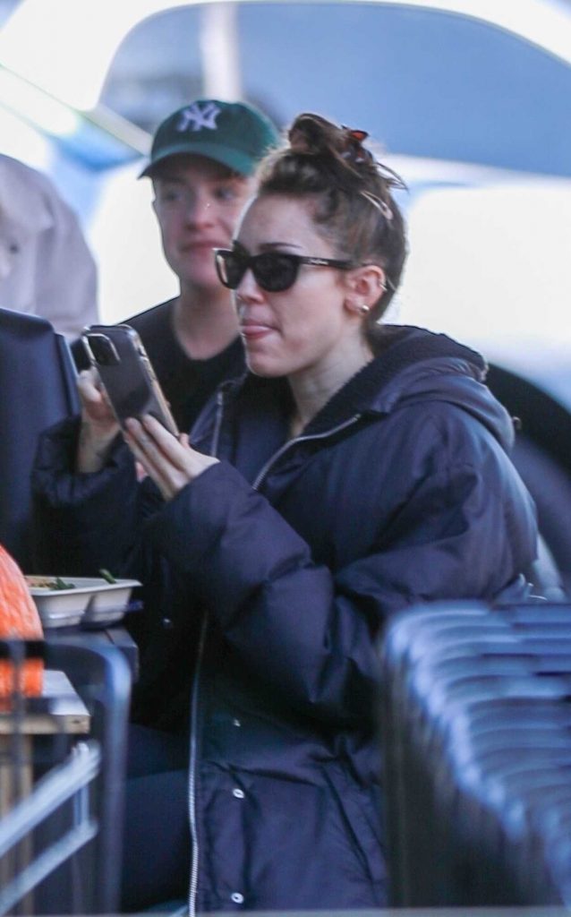 Miley Cyrus in a Black Puffer Jacket