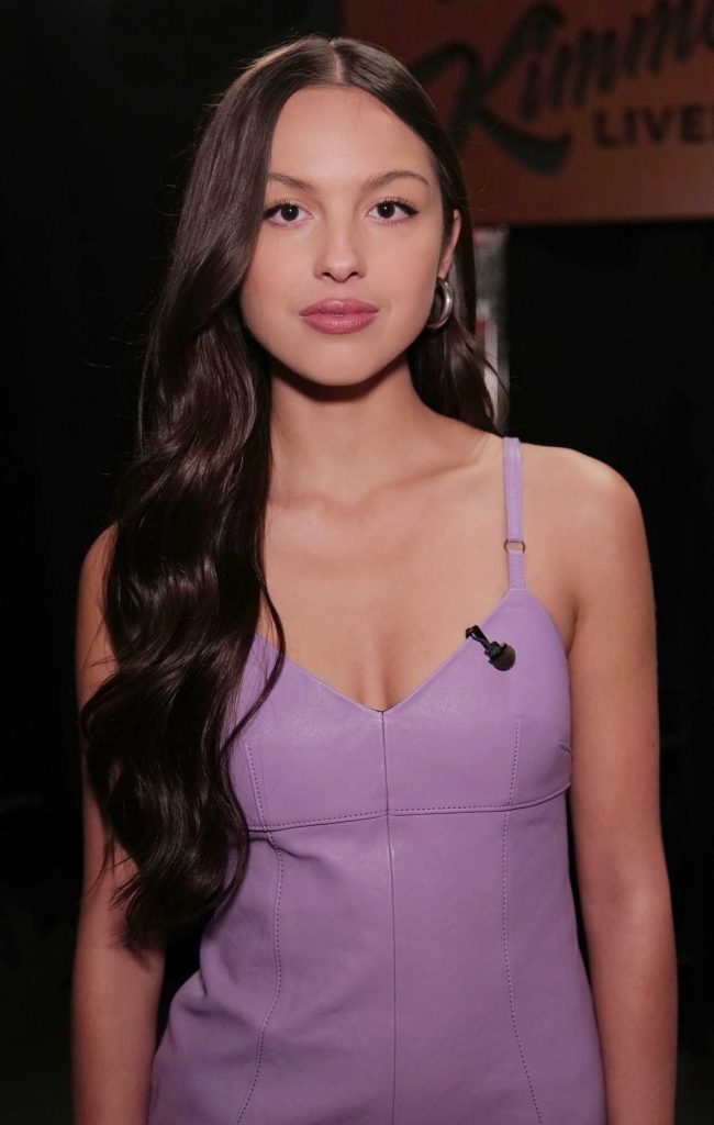Olivia Rodrigo in a Purple Leather Mini Dress