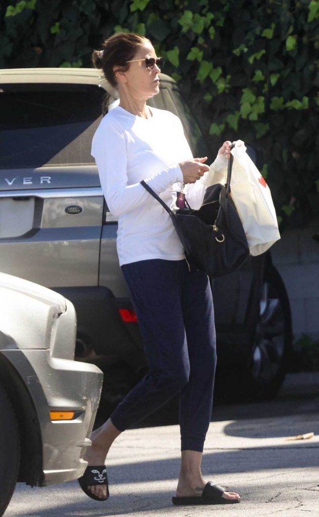 Teri Hatcher in a White Long Sleeves T-Shirt