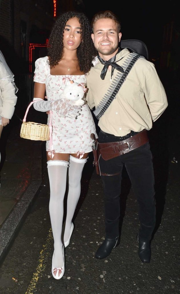 Anya Lawrence in a White Floral Mini Dress