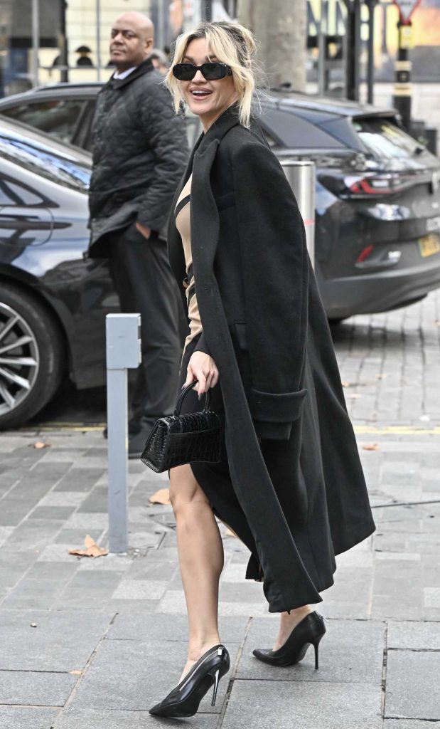 Ashley Roberts in a Black Coat