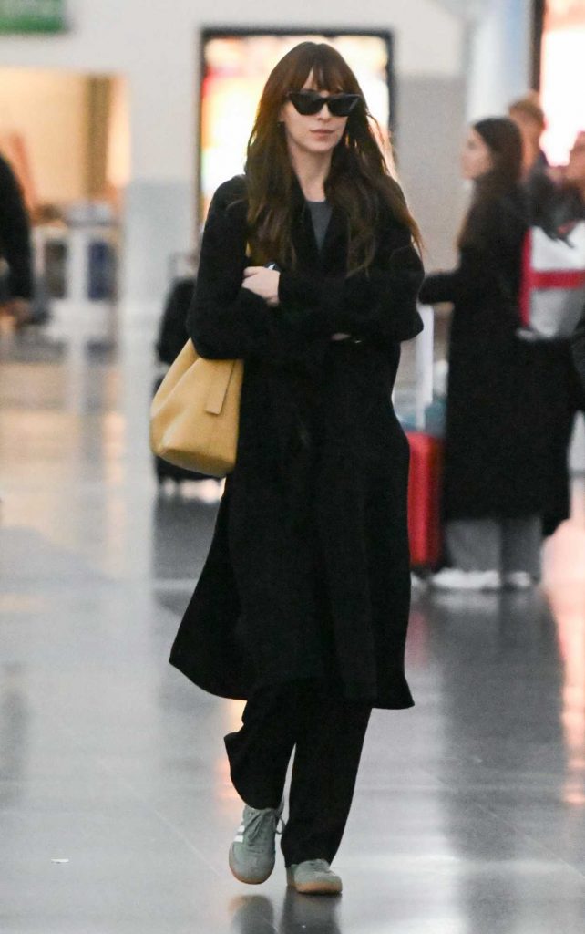 Dakota Johnson in a Black Coat