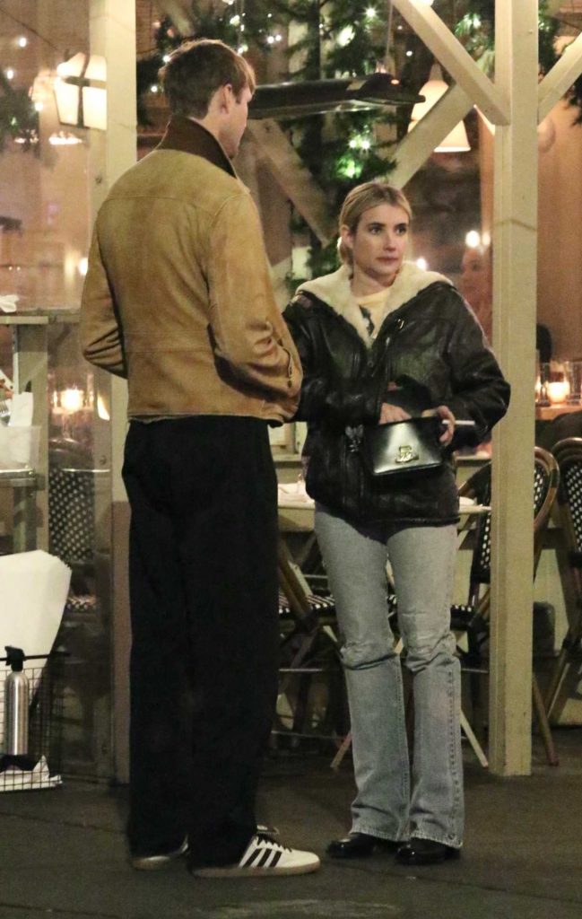 Emma Roberts in a Black Leather Jacket