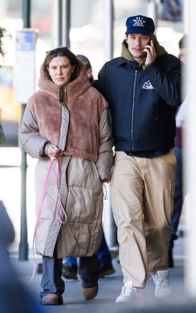 Millie Bobby Brown in a Beige Puffer Coat