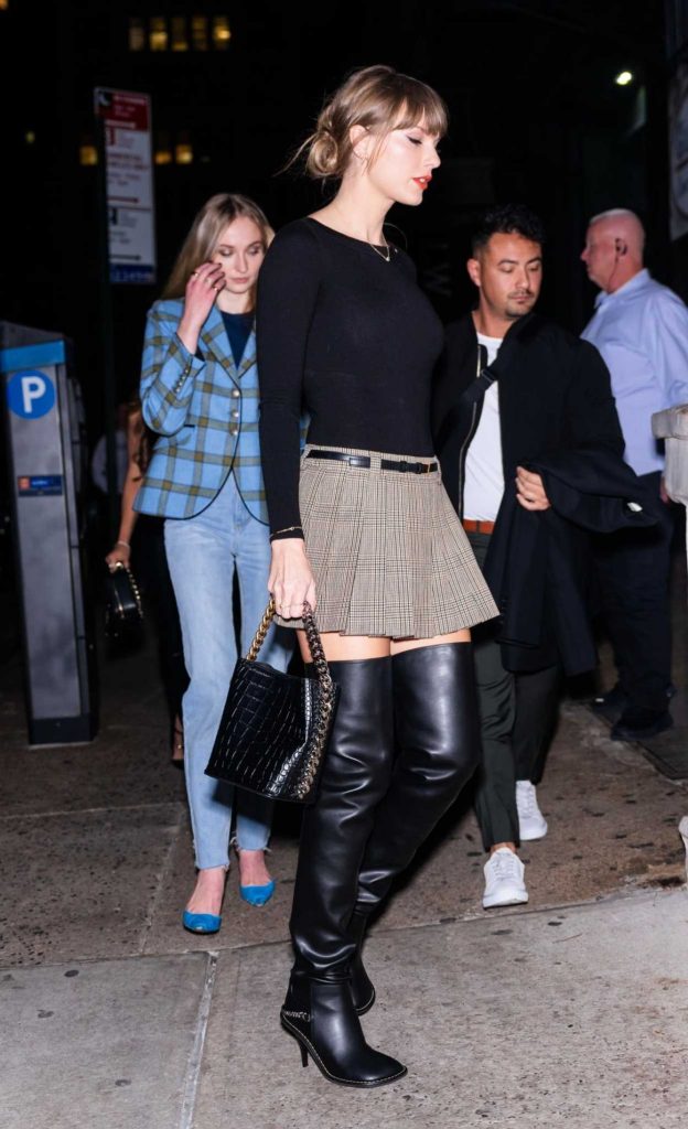 Taylor Swift in a Black Over The Knee Boots