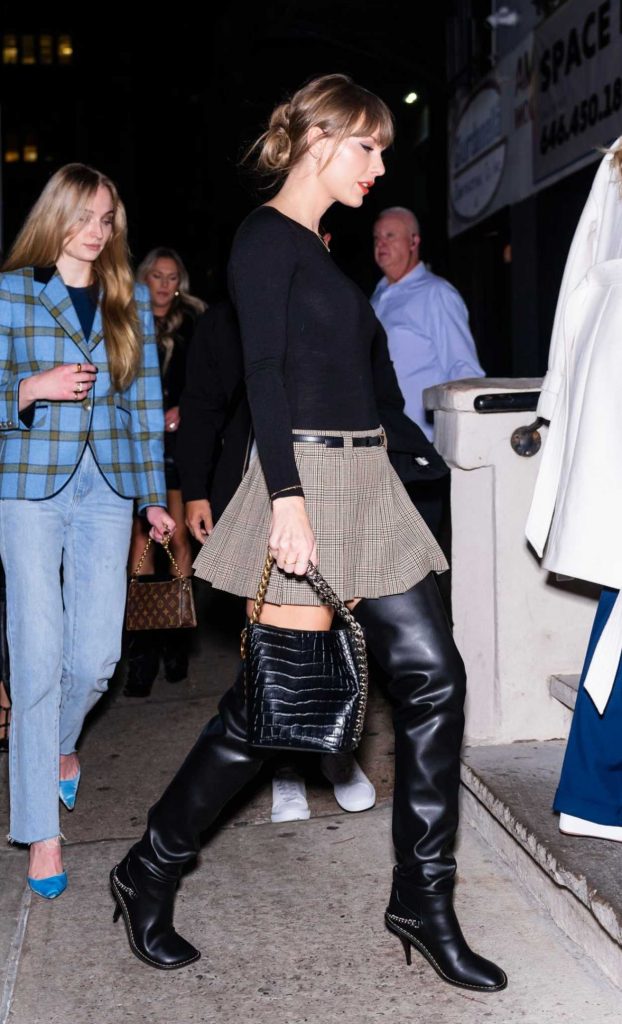 Taylor Swift in a Black Over The Knee Boots