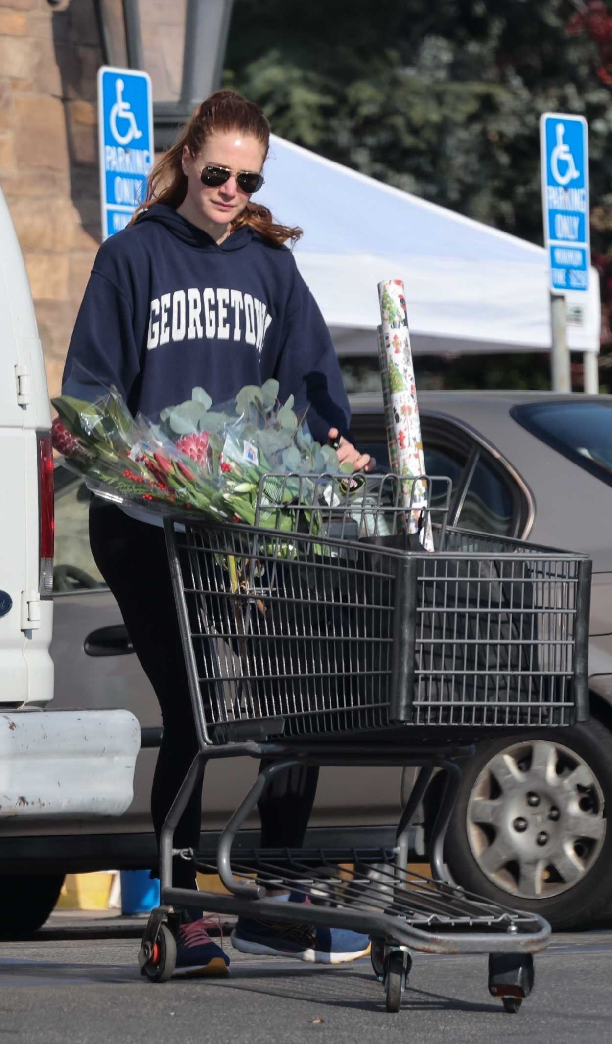 Anna Osceola in a Navy Hoodie Goes on a Grocery Run in Los Feliz 12/29